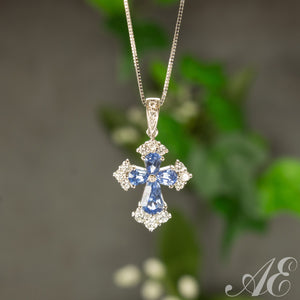 -18k white gold sapphire and diamond cross pendant