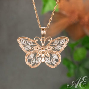 -14k rose gold butterfly pendant