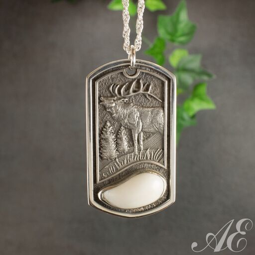-Sterling silver dog tag with elk ivory