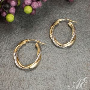 -14k gold two tone oval twisted hoop earrings