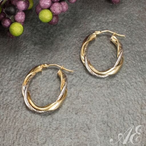 -14k gold two tone oval twisted hoop earrings